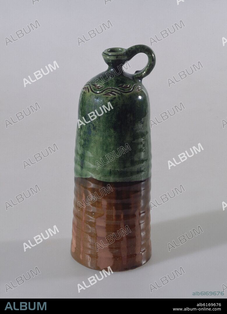 ALCUZA VIDRIADA EN VERDE Y ROJO (OXIDO DE COBRE Y MANGANESO).