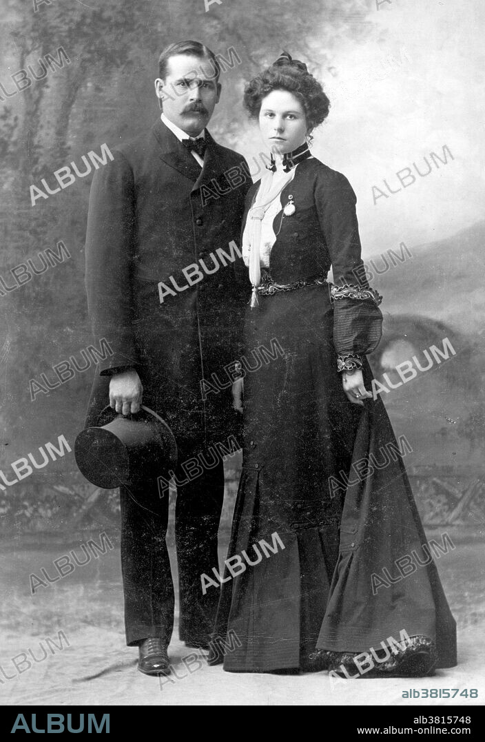 Harry Longabaugh and Etta Place photographed by De Young Photograph Studio, NYC, 1901. Harry Alonzo Longabaugh (1867 - November 7, 1908), better known as the Sundance Kid, was an outlaw and member of Butch Cassidy's Wild Bunch in the American Old West. Longabaugh likely met Butch Cassidy after he was released from prison around 1896. Together with the other members of "The Wild Bunch" gang, they performed the longest string of successful train and bank robberies in American history. After pursuing a career in crime for several years in the United States, the pressures of being pursued, notably by the Pinkerton Detective Agency, forced Longabaugh, his girlfriend Etta Place, and Cassidy to abandon the United States. The trio fled first to Argentina and then to Bolivia, where Parker and Longabaugh were probably killed in a shootout in November 1908. Little is known about Etta Place; both her origin and her fate remain mysterious. Despite Longabaugh and Parker's fame, by the mid 20th century, it was the mysterious vanishing of Place that sparked the most interest. The Pinkerton Detective Agency described her in 1906 as having, "...classic good looks, 27 or 28 years old, 5'4' to 5'5"'in height, weighing between 110 lbs. and 115 lbs., with a medium build and brown hair.".