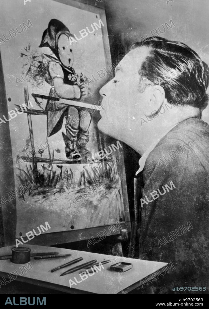 Disabled artist Arnulf Erich Stegmann finishes off a crayon painting. 23 March 1950.