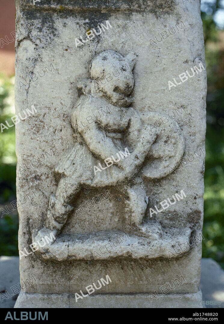 Relief of the Thraex, type of Roman gladiator, armed in the Thracian style with small shield "parmula", short sword "sica", armoured greaves, helmet with a side plume and visor and high crest. Aphrodisias. Anatolia, Turkey.