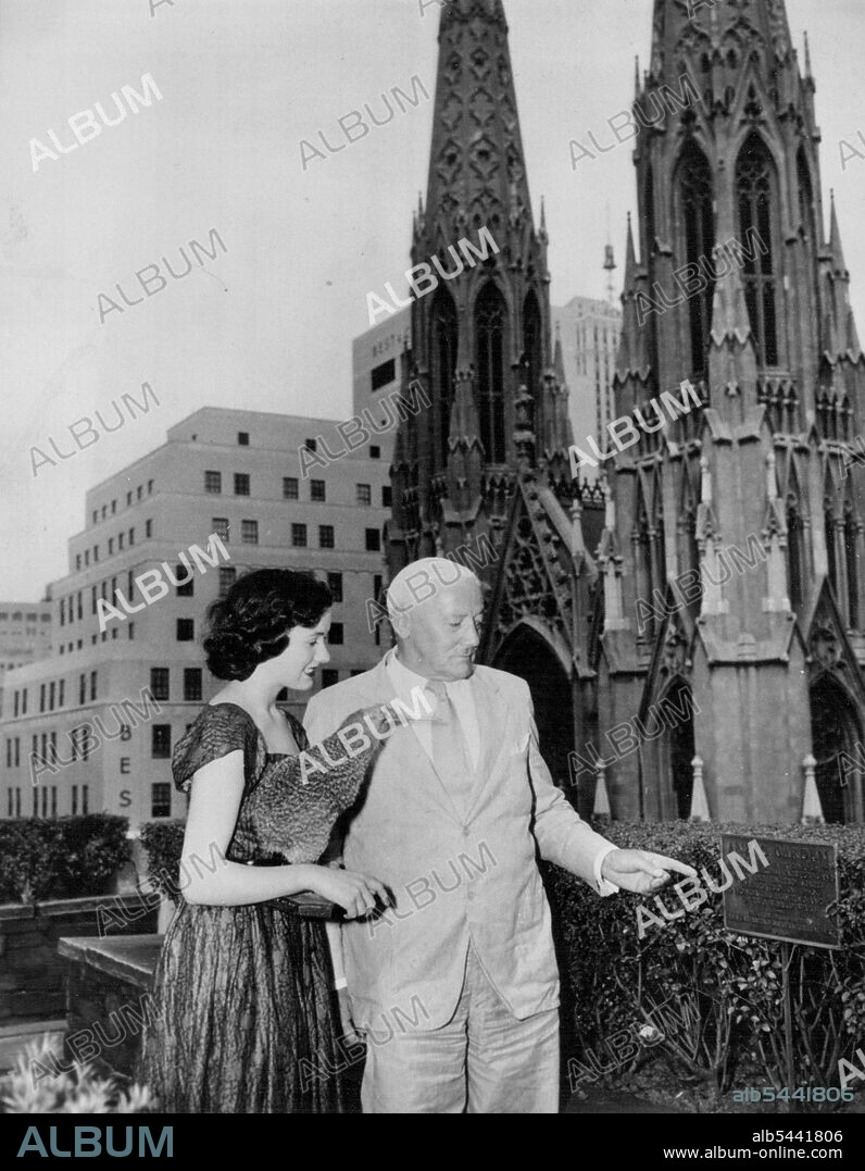 Miss Teenage of Australia in New York - Diane Bell, Miss Teenage of Australia, is shown the Anzac memorial garden at Rockfeller Centre, New York City, by Australian Consul General Lt. Gen. E.K. Smart recently. In background is St. Patrick's Cathedral. Diane won a fund-raising contest for an Australian hospital for her poise, personality and looks. She raised over $6,000 for the hospital. August 28, 1952. (Photo by Associated Press Photo).