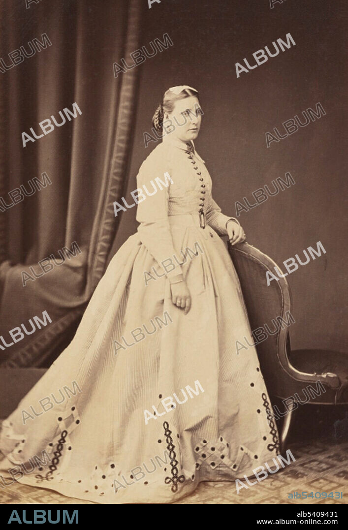Florence Barbara Maria von Sass (August 6, 1841 - March 11, 1916) was a Hungarian-born British explorer. Orphaned during the Hungarian Revolution of 1848, she was sent to an Ottoman harem, where she lived as a chore girl until she hit puberty, when she was sold to a slave auction. Samuel Baker (June 8, 1821 - December 30, 1893) an English explorer, and big game hunter, became entranced by the teenager on the slave block. When he couldn’t outbid the pasha, he bribed the guards and Florence was allowed to escape with him. They set off to Africa in 1861, first exploring Ethiopia, then setting their sights on discovering the source of the River Nile. In 1869 they returned to Gondokoro as abolitionists.  Photographed by Henry Maull, 1875.