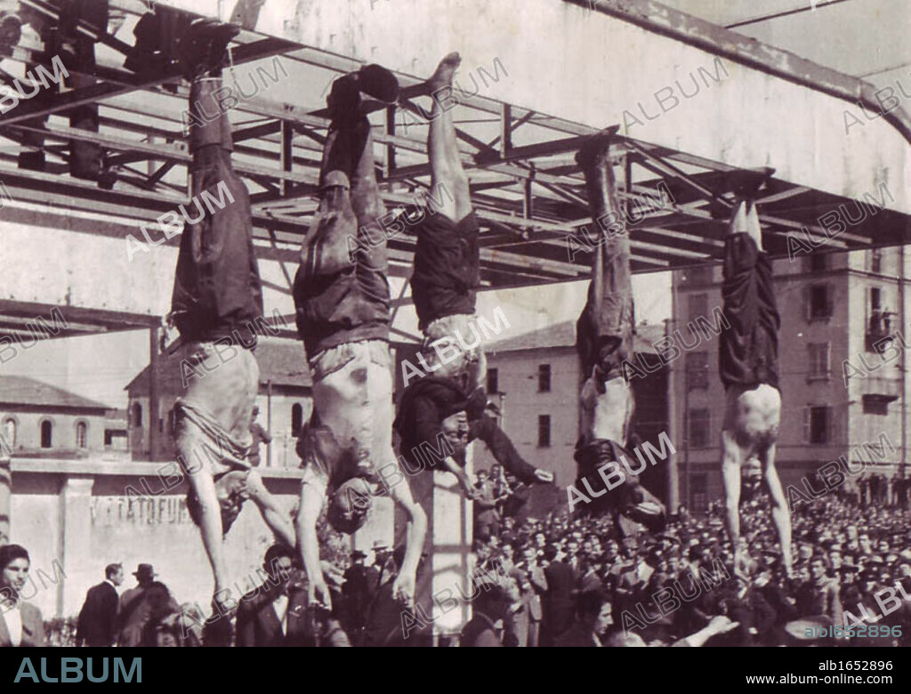 Benito Mussolini (1883-1945) and his mistress Clara Petacci hanging in a public square after their execution by Italian Communist partisans in April 1945.