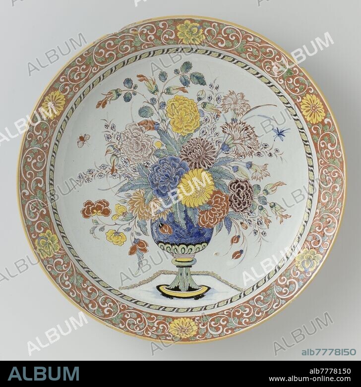 Dish Dish Dish, multi-colored painted with a flower vase, Dish of faience. Multicolored painted with a flower vase and border with tendrils ornament, flowers in a vase, anonymous, Delft, c. 1740 - c. 1770, d 35.5 cm.