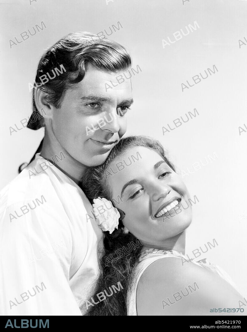 CLARK GABLE y MAMO CLARK en REBELIÓN A BORDO, 1935 (MUTINY ON THE BOUNTY), dirigida por FRANK LLOYD. Copyright M.G.M.