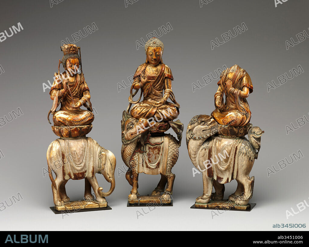 Buddha Shakyamuni with attendant bodhisattvas, Southern Song (1127–1279)–Yuan (1271–1368) dynasty, 12th–14th century, China, Mammoth ivory, H. 9 1/4 in. (23.5 cm), Sculpture, This extraordinary group is a rare example of Buddhist sculpture made in China using mammoth ivory as opposed to elephant ivory. Based on a text known as the Flower Garland Sutra, it depicts the founder of Buddhism, Shakyamuni, seated on a mythical animal known as a qilin and attended by the bodhisattvas Samantabhadhra (Chinese: Puxian) on an elephant and Manjushri (Chinese: Wenshu) on a lion.