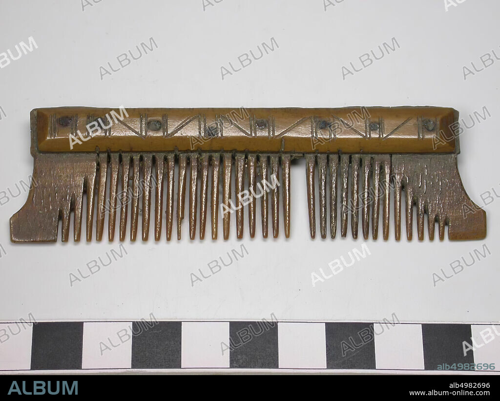 One-sided three layer comb. Type: Originally this comb was a double-sided comb. Form: The comb is now one-sided and elongated. Originally, this comb was two-sided. Saw marks on the top and bottom of the handle blades. The teeth of one of the sides have been sawn off. The teeth plates are straight filed. The shape of this comb corresponds to the shape of double-sided combs. The comb has concave short sides. This is a Frisian development. Decoration: handle sheets: lines, which form triangles and vertical lines. Both handles: identical decorated. The handle blades are narrow. Tooth plates: 4. End plates: 2. Teeth: 35 and 1 chipped tooth. Original number of teeth: 36.Light worn teeth. Fine teeth. Rivets: 8. Saw marks on the handle blades: First the teeth plates have been attached to the handle blades and when the teeth have been sawn in them, comb, organic, leg, l = 10 cm and b = 2.7 cm., Vmec 750-900.