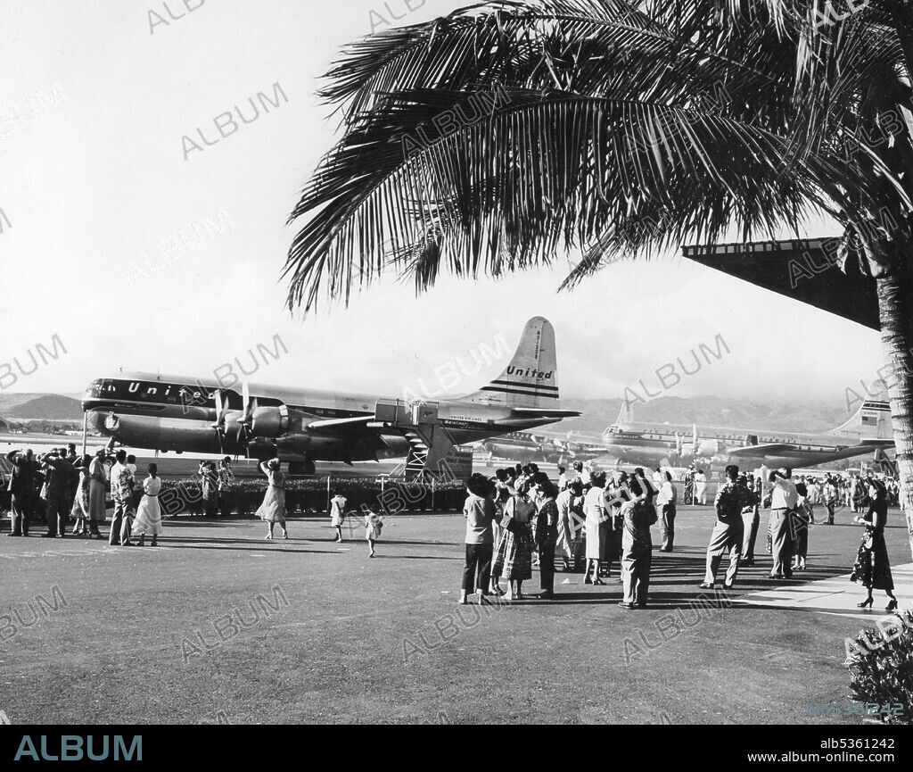 Families see off departing passengers at Honolulu's International Airport, which served as a stop-over for much of the air and sea traffic between the continental United States, the Far East and the Pacific, Honolulu, HI, 1951. (Photo by Photo Hawaii/GG Vintage Images).