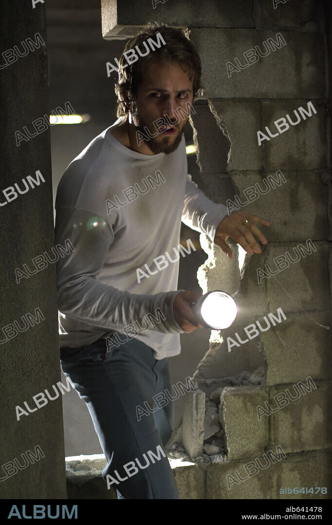 RYAN REYNOLDS en LA MORADA DEL MIEDO, 2005 (THE AMITYVILLE HORROR), dirigida por ANDREW DOUGLAS. Copyright METRO GOLDWYN MAYER / IOVINO, PETER.