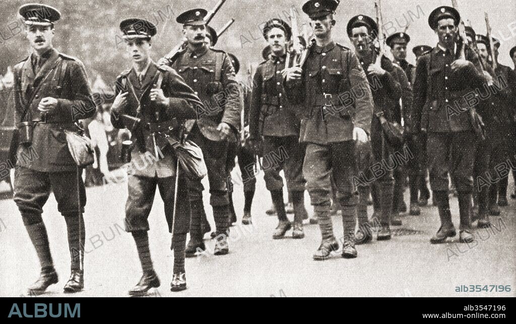 The Prince of Wales leading his company of Grenadier Guards on a route march in full service kit during WWI. From The Pageant of the Century, published 1934.