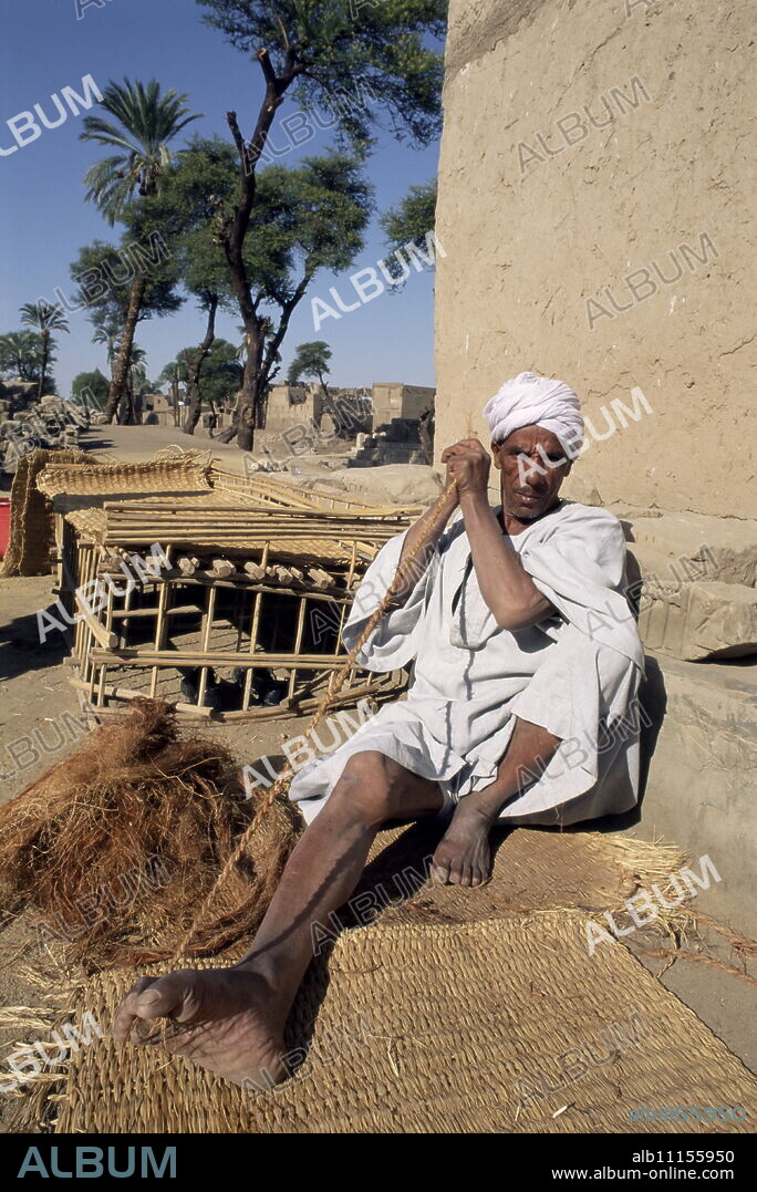 Villager making tether rope, Tod, near Luxor, Egypt, North Africa, Africa.