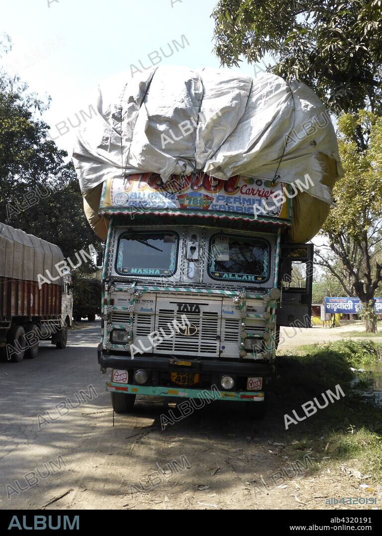 Tata truck with heavy load, India.
