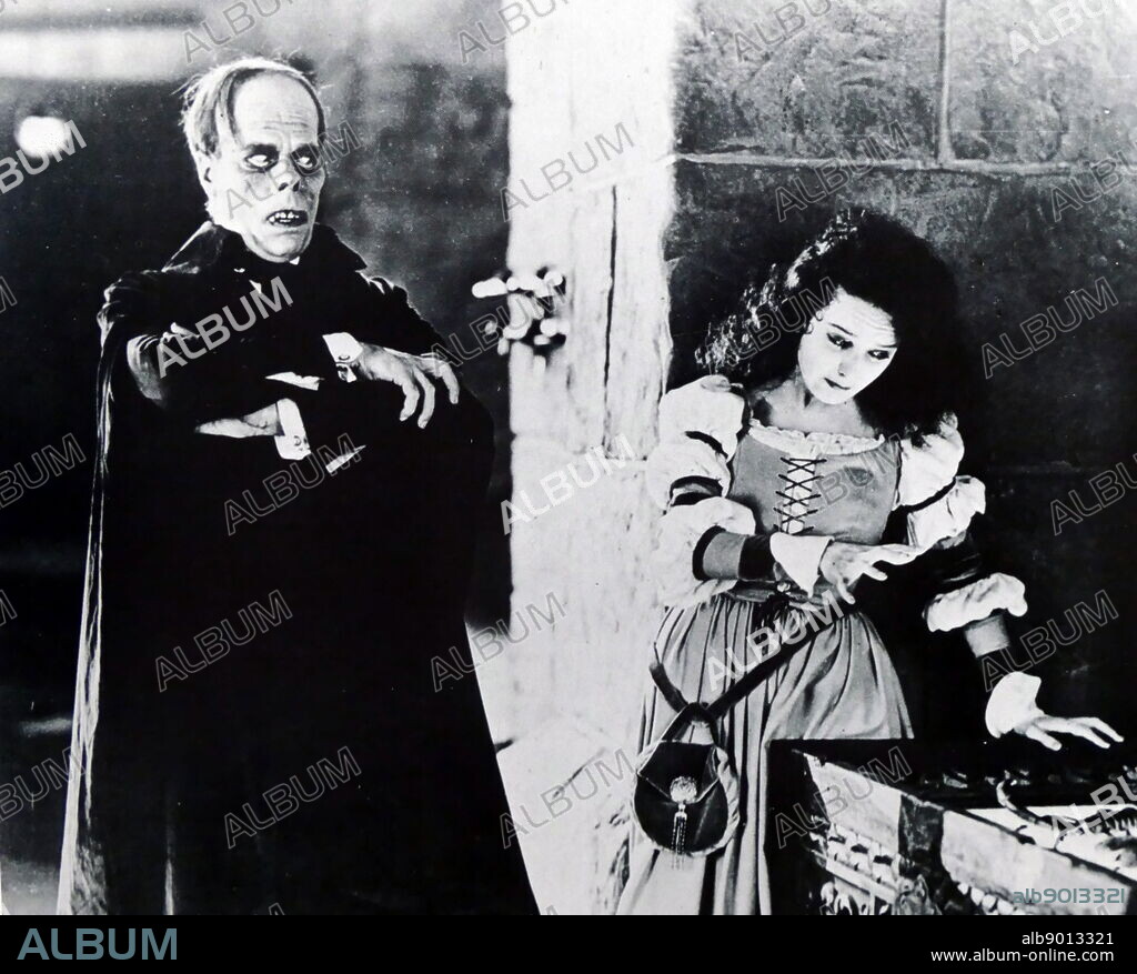 Lon Chaney and Mary Philbin in 'The Phantom of the Opera' a 1925 American silent horror film adaptation of Gaston Leroux's 1910 novel, directed by Rupert Julian and starring Lon Chaney, Sr. in the title role. Lon Chaney (1883 - 1930); American stage and film actor, make-up artist, director and screenwriter. renowned for his characterizations of tortured, often grotesque and afflicted characters, and his ground-breaking artistry with makeup. Mary Loretta Philbin (1902 - 1993); American film actress of the silent film era.