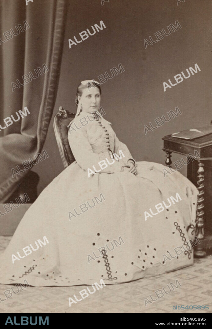 Florence Barbara Maria von Sass (August 6, 1841 - March 11, 1916) was a Hungarian-born British explorer. Orphaned during the Hungarian Revolution of 1848, she was sent to an Ottoman harem, where she lived as a chore girl until she hit puberty, when she was sold to a slave auction. Samuel Baker (June 8, 1821 - December 30, 1893) an English explorer, and big game hunter, became entranced by the teenager on the slave block. When he couldn’t outbid the pasha, he bribed the guards and Florence was allowed to escape with him. They set off to Africa in 1861, first exploring Ethiopia, then setting their sights on discovering the source of the River Nile. In 1869 they returned to Gondokoro as abolitionists. Photographed by Henry Maull, 1875.