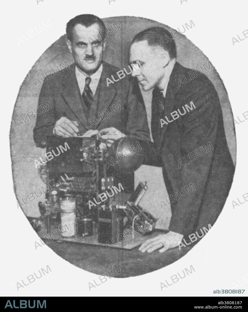 Compton (left) and his assistant, Richard Doan, look over equipment that Compton built for recording the intensity of cosmic rays in the stratosphere. The equipment will be carried into the stratosphere on a balloon and the measurements will be transmitted to the ground by radio. Arthur Holly Compton (September 10, 1892 - March 15, 1962) was an American physicist. In 1919, Compton was awarded a National Research Council Fellowship that allowed students to study abroad. He chose the Cavendish Laboratory in England, where he studied the scattering and absorption of gamma rays which led to the discovery of the Compton effect. He used X-rays to investigate ferromagnetism, concluding that it was a result of the alignment of electron spins, and studied cosmic rays, discovering that they were made up principally of positively charged particles. He won the Nobel Prize in Physics in 1927 for his discovery. During WWII, he was a key figure in the Manhattan Project that developed the first nuclear weapons. After the war, Compton became Chancellor of Washington University in St. Louis. During his tenure, the university formally desegregated its undergraduate divisions, named its first female full professor, and enrolled a record number of students after wartime veterans returned to the United States. He died in 1962 from a cerebral hemorrhage at the age of 69.