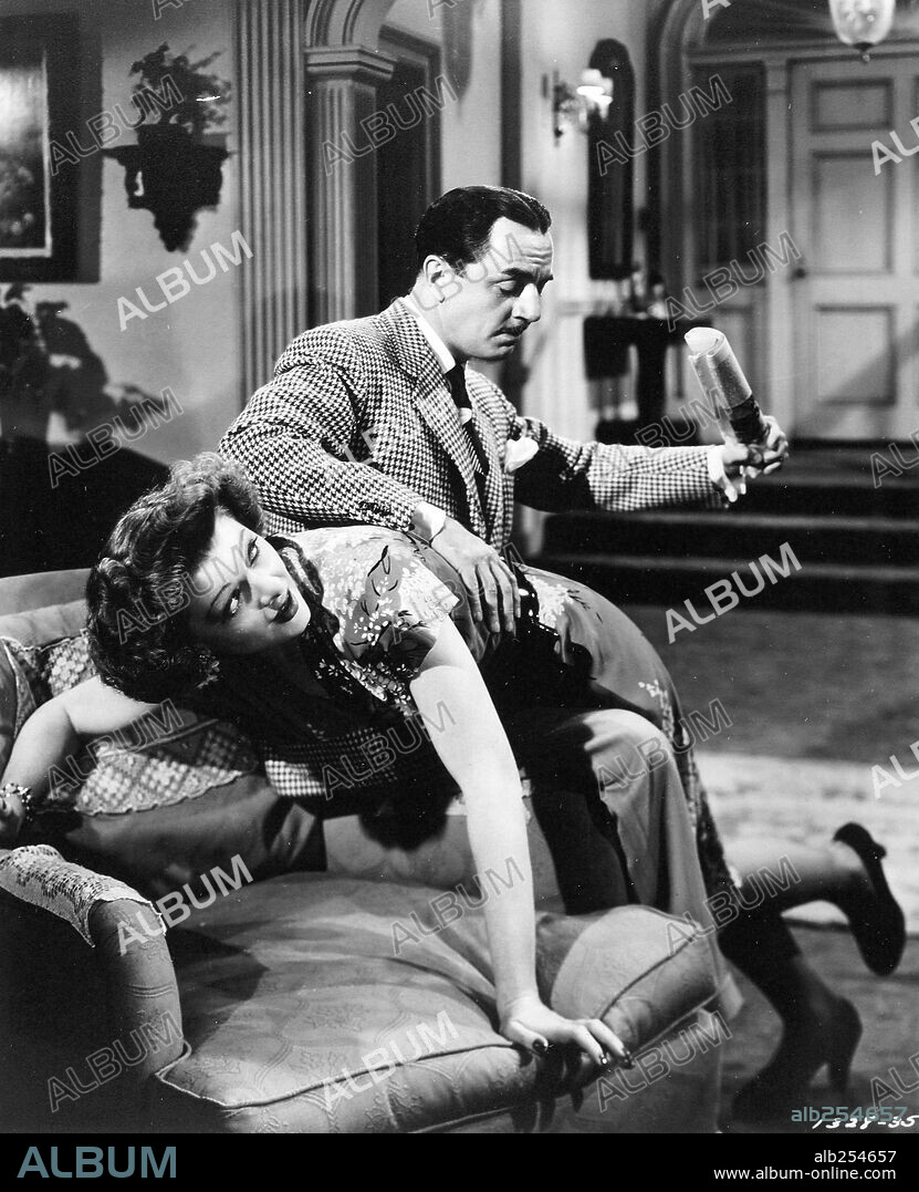 MYRNA LOY y WILLIAM POWELL en EL HOMBRE DELGADO VUELVE A CASA, 1944 (THE THIN MAN GOES HOME), dirigida por RICHARD THORPE. Copyright M.G.M.