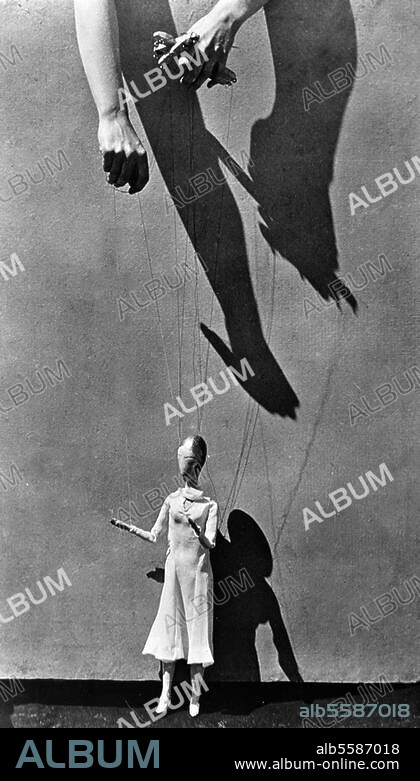 TINA MODOTTI. Modotti, Tina Italian-Mexican photographer, 1896-1942. "Puppets", Mexico, 1926. Photo.