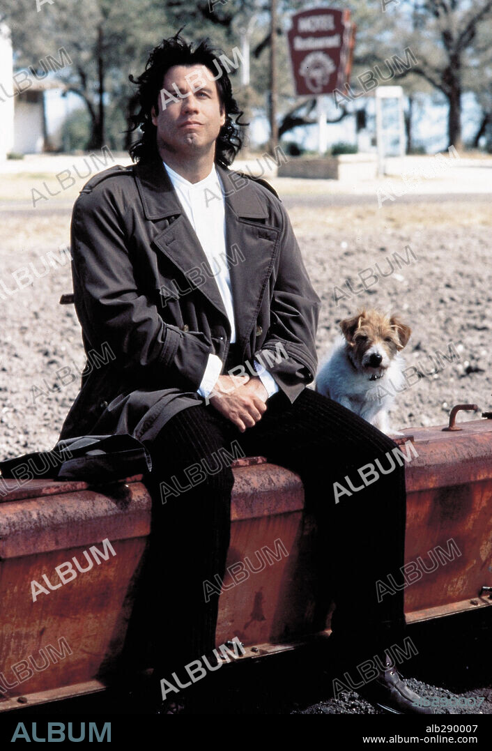 JOHN TRAVOLTA in MICHAEL, 1996, directed by NORA EPHRON. Copyright ALPHAVILLE/NEW LINE CINEMA/TURNER PICTURES.