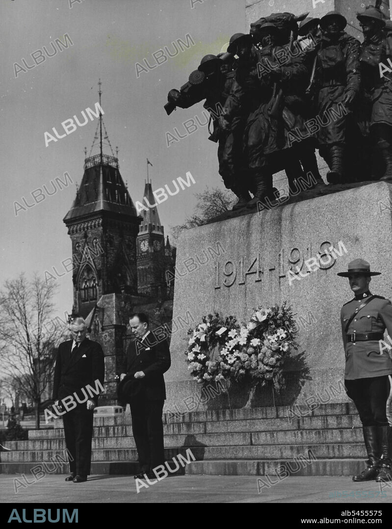 "Anzac Day" Marked in Canada's National Capital - The heroic feats of Australian and New Zealand ***** Gallipoli Campaign of the First World Far were remombere ***** commemorated in Ottawa on April 25 ***** service at the National War Memorial ***** James Thorn, respectively High Commissions ***** in Canada, are shown above after they placed ***** . Anzac Day in Ottawa (Canada). Mr. James Thorn and Mr. F. M. Forde, NZ and Australian High Commissioners to Canada, are shown after placing wreaths at the National War Memorial in memory of Austral.an and NZ fallen. May 10, 1949. (Photo by Central Press Service).