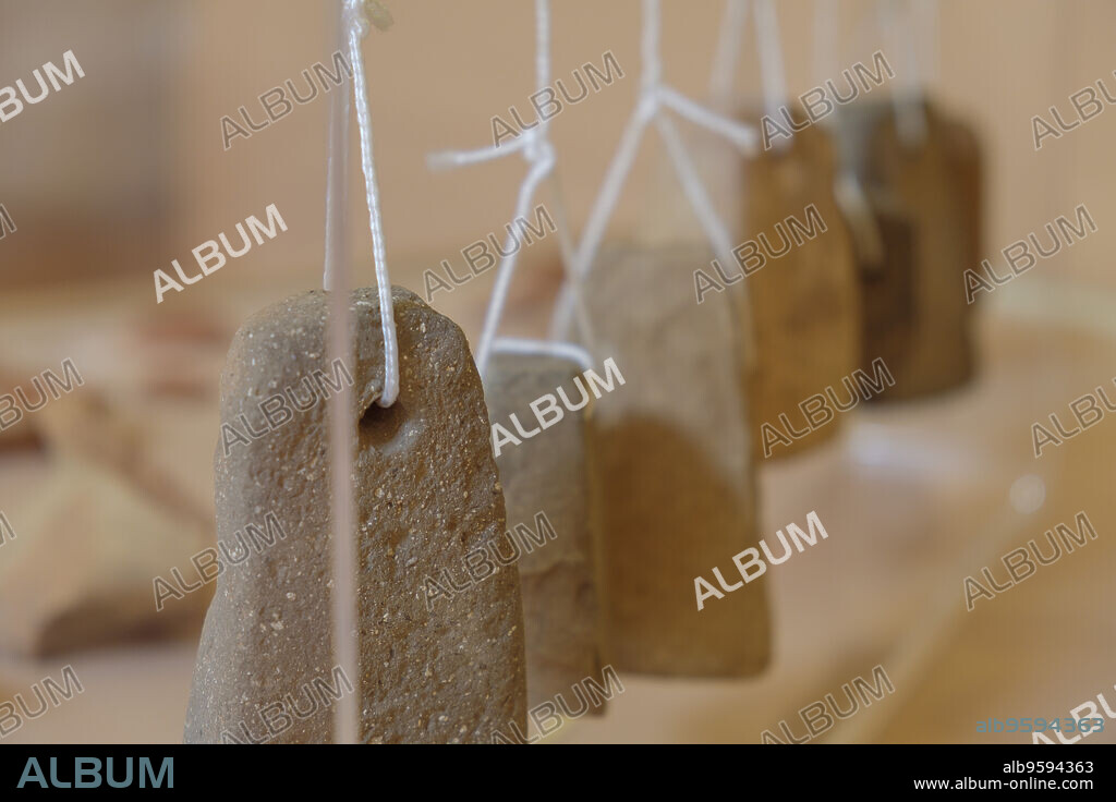 contrapesos de un telar vertical romano, Museu Municipal de Ciutadella,. Bastió de sa Font, Ciutadella, Menorca,balearic islands, Spain.
