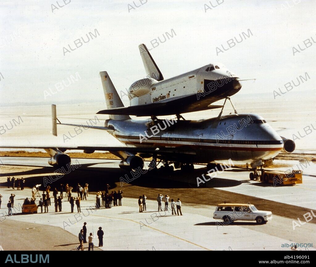 Roll-out of Space Shuttle Orbiter 'Enterprise', California, USA, 17 September 1976. The 'Enterprise' (OV-101) was built as part of NASA's Space Shuttle programme to perform atmospheric test flights after being launched from a modified Boeing 747 aircraft. OV-101, the first Space Shuttle orbiter, was built at the Palmdale manufacturing facilities in California. It was named the 'Enterprise' after the famous command of Captain James T Kirk, following a campaign by "Star Trek" fans. Its last flight was in 2012.