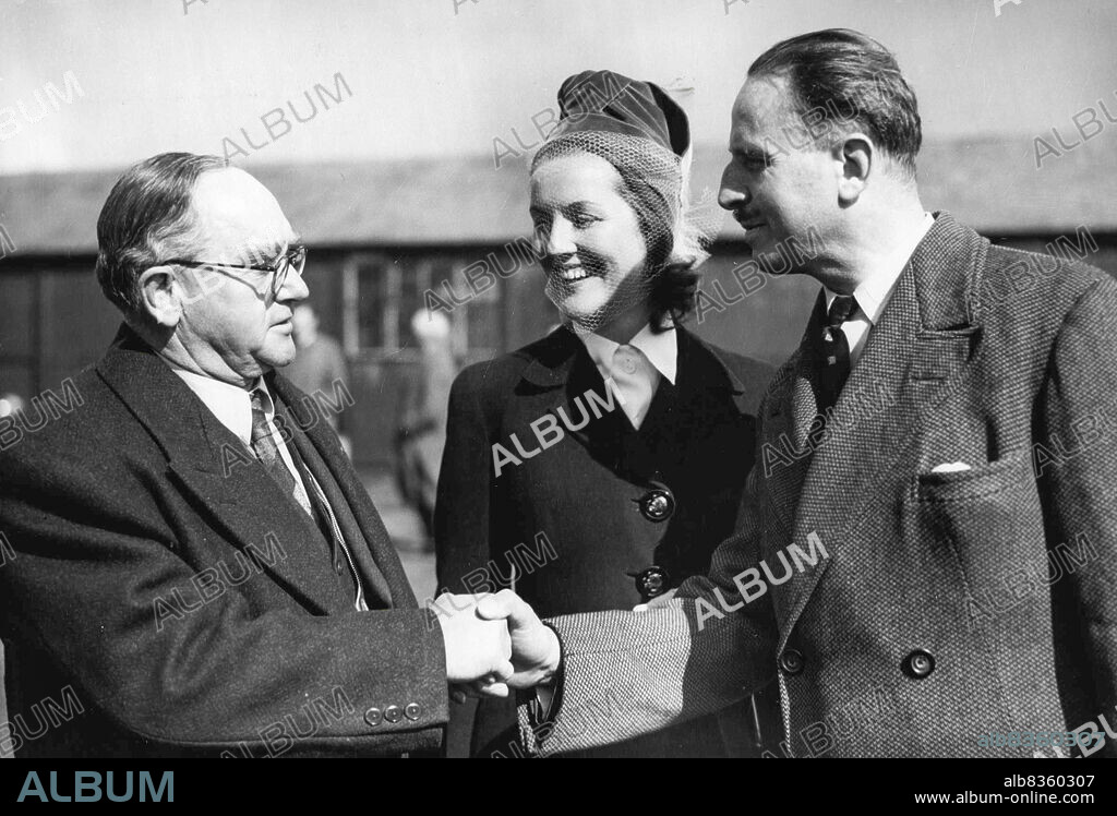 Oswald Pirow Arrives From South Africa. Sir Oswald Mosley shakes