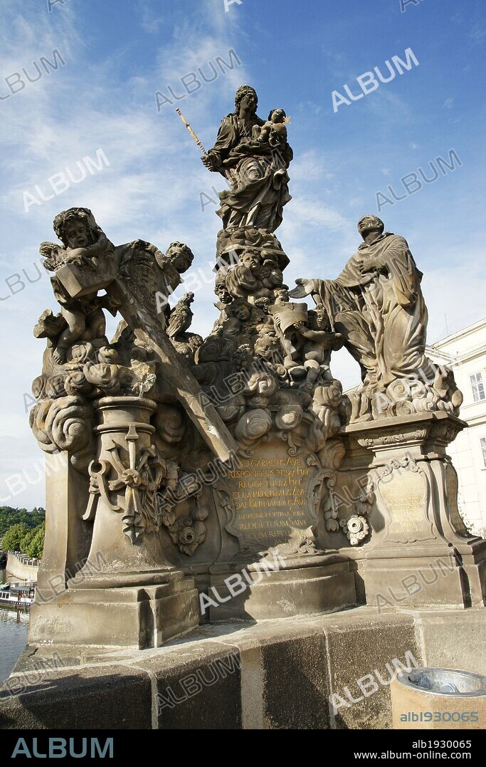 Our Lady and St. Bernard. By Matej Vaclav Jackel (1709). 18th century. Baroque sculpture decorating the Charles Bridge. Copy of the original. Prague. Czech Republic.
