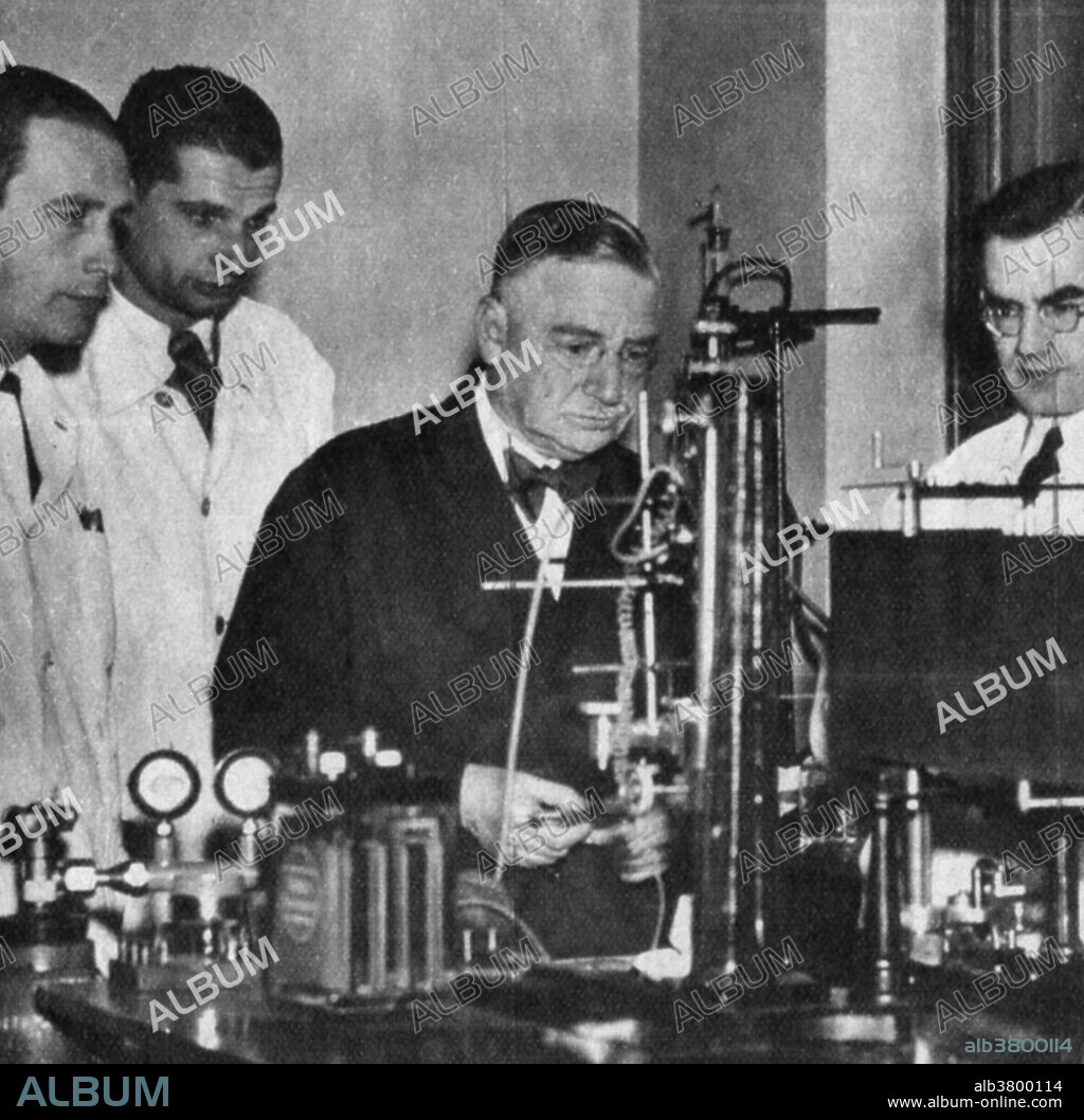 Austrian professor Otto Loewi, winner of the 1936 Nobel Prize in Medicine for his discovery of acetylcholine, seen here with a group of his students in the labortory of the University at Graz, Austria.