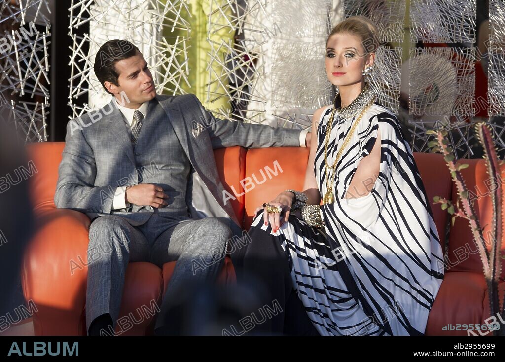 ELIZABETH DEBICKI and HENRY CAVILL in THE MAN FROM U. N. C. L. E., 2015, directed by GUY RITCHIE. Copyright WARNER BROS.