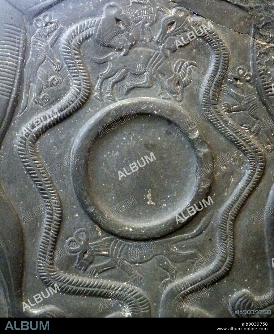 The double sided (Two-Dog) palette. Ancient Egyptian 3300-3100 B.C. A ceremonial object carved in relief depicting hunting and animals.