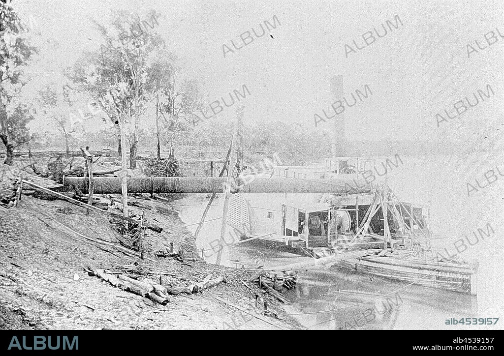 Negative - Paddlesteamer Jane Eliza Working as a Pumping Barge for Chaffey Bros, Mildura, Victoria, circa 1888, The paddlesteamer Jane Eliza was built at Moama in 1867 and had a long career on the Murray-Darling River system working as a passenger and cargo vessel. In May 1883 to June 1886 the vessel set an inauspicious record for the longest river journey taking 37 months to steam 1,300 miles upstream from Morgan in South Austalia to Bourke on the upper Darling River, its progress having been impeded by.