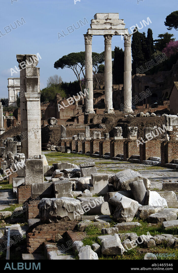 Italy. Rome. Temple of Castor and Pollux. 1st century BC. Built in honor to the Dioscuri. On the left, ruins of the Basilica Julia. Roman Forum.