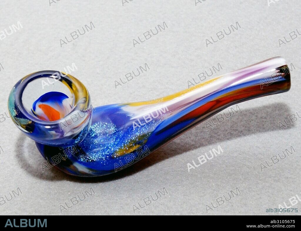 A glass Meth Pipe for inhaling Methamphetamine (also called methylamphetamine, desoxyephedrine, Crystal Meth (or just meth) a man-made stimulant drug.