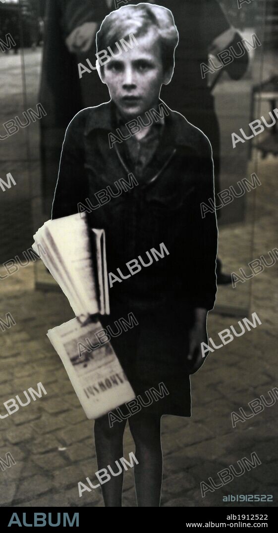 Museum of Oskar Schindler's Factory. Historical photo. Jewish boy selling newspapers. Krakow. Poland.