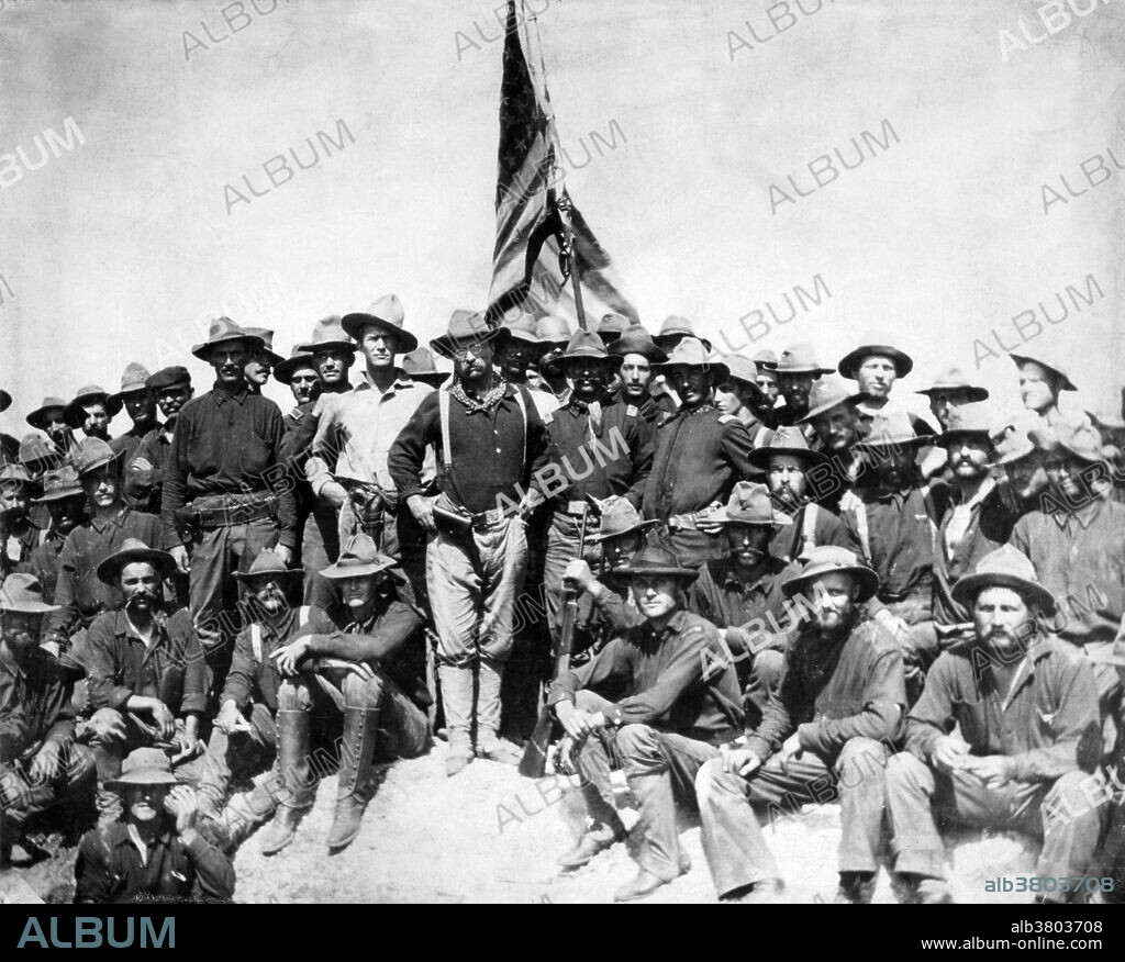 Entitled: "Colonel Roosevelt and his Rough Riders at the top of the hill which they captured, Battle of San Juan." US Army victors on Kettle Hill about July 3, 1898. The Battle of San Juan Hill (July 1, 1898) was a decisive battle of the Spanish-American War. The San Juan heights was a north-south running elevation about two kilometers east of Santiago de Cuba, Cuba. The names San Juan Hill and Kettle Hill were given to the location by the Americans. This fight for the heights was the bloodiest and most famous battle of the war. It was also the location of the greatest victory for the Rough Riders, as claimed by the press and its new commander, the future vice-president and later president, Theodore Roosevelt. The American press at the time overlooked the fact that the Buffalo Soldiers of the 10th Cavalry and 24th Infantry Regiments had actually done much of the heaviest fighting. The Spanish-American War was a conflict in 1898 between Spain and the United States, the result of US intervention in the Cuban War of Independence. Photographed by William Dinwiddie, July 1, 1898.