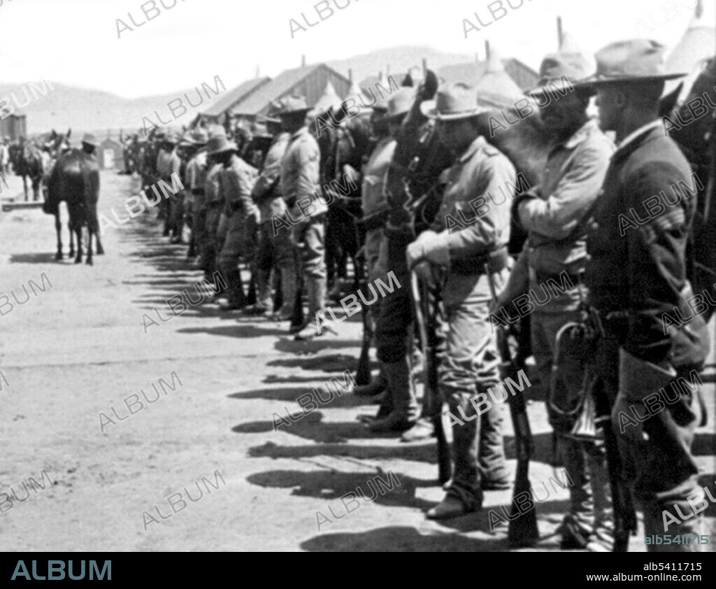Inspection of Co. H, 9th Cavalry on the Presidio. Buffalo Soldiers originally were members of the US 10th Cavalry Regiment of the US Army. This nickname was given to the "Negro Cavalry" by the Native American tribes they fought in the Indian Wars. The term became synonymous with all of the African-American regiments formed in 1866: 9th Cavalry Regiment, 10th Cavalry Regiment, 24th Infantry Regiment, and 25th Infantry Regiment. Cropped stereograph, Keystone View Company, 1900.