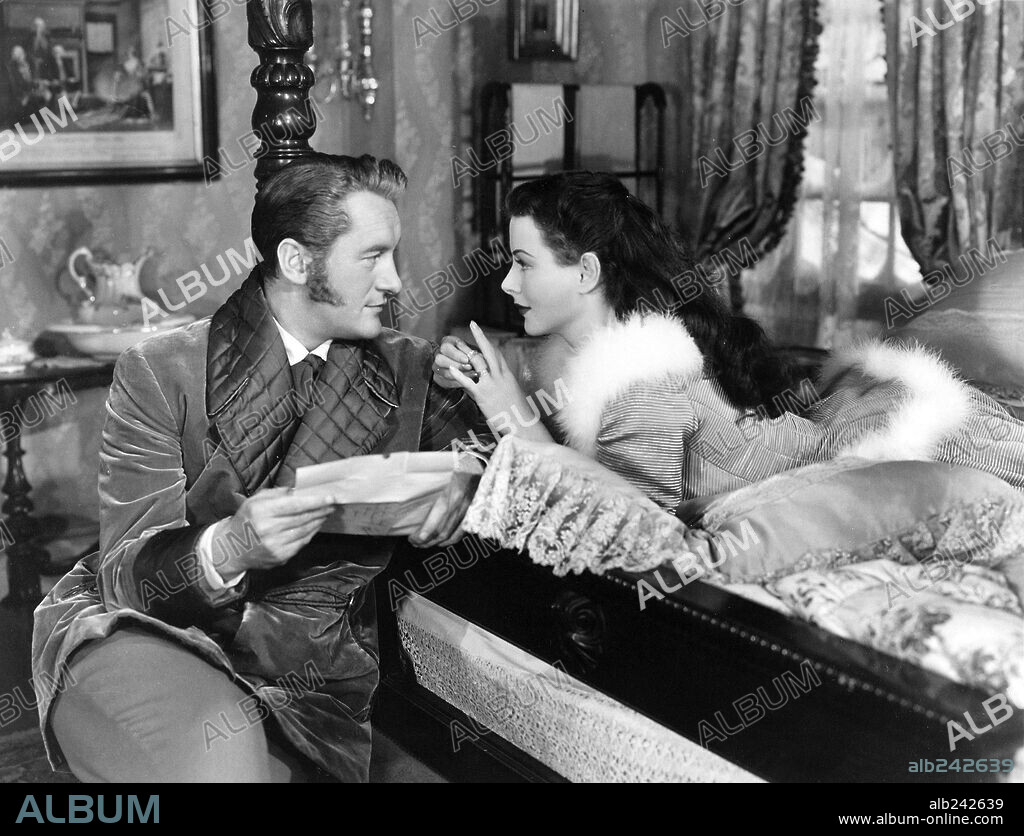 GEORGE SANDERS and HEDY LAMARR in THE STRANGE WOMAN, 1946, directed by EDGAR ULMER. Copyright UNITED ARTISTS.