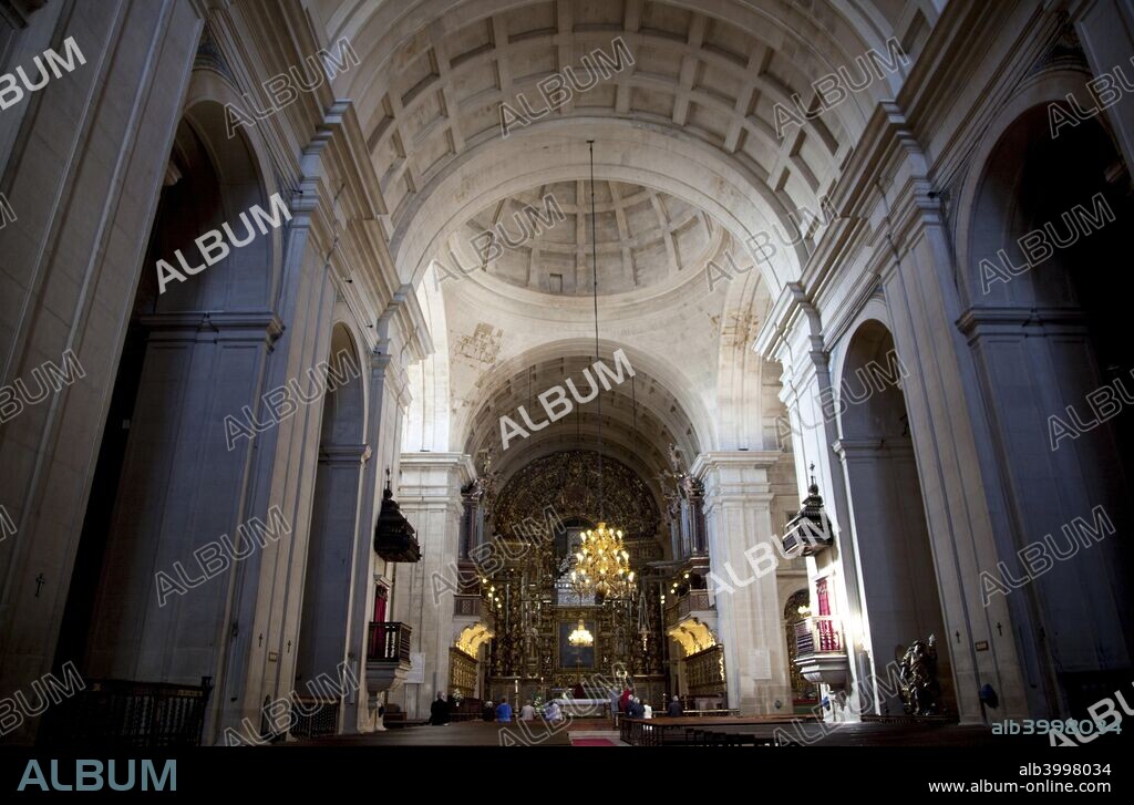 The New Cathedral of Coimbra, Portugal, 2009. The New Cathedral was, originally, the church of the Jesuit College of Coimbra, established in the city in 1541. In 1772, the bishopric seat was transferred from the old Romanesque Cathedral of the city (now called the Old Cathedral of Coimbra) to the vacant, spacious and more modern Jesuit church. The church architecture was influential in the Portuguese colonial world. The facade of the former Jesuit church of Salvador, in colonial Brazil (now the Cathedral of Salvador), built in the 17th century, seems inspired by the Jesuit church of Coimbra.