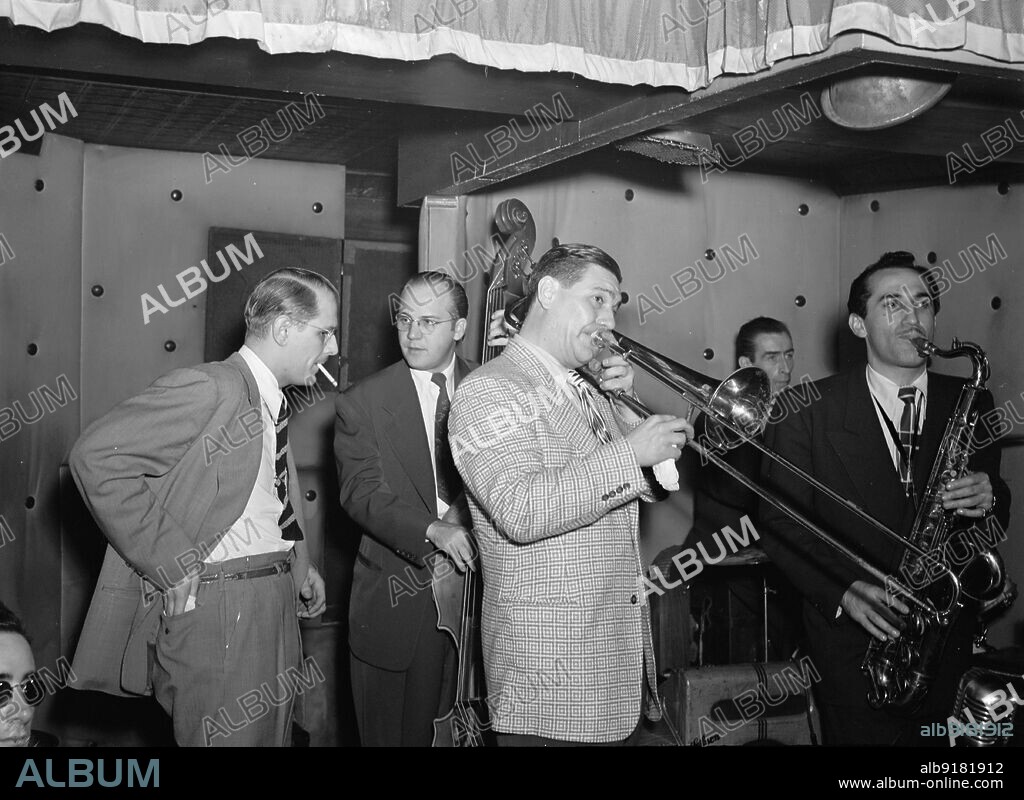 WILLIAM PAUL GOTTLIEB. Portrait of Jack Teagarden, Bill Harris, Dave Tough, and Charlie Ventura, Three Deuces, New York, N.Y., 1946.