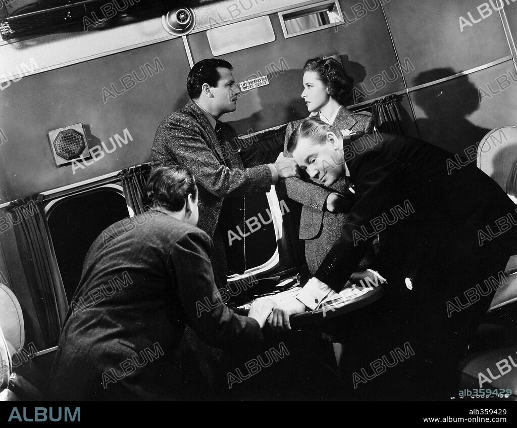 GEORGE SANDERS, HERBERT MARSHALL, JOEL MCCREA and LARAINE DAY in FOREIGN CORRESPONDENT, 1940, directed by ALFRED HITCHCOCK. Copyright UNITED ARTISTS.