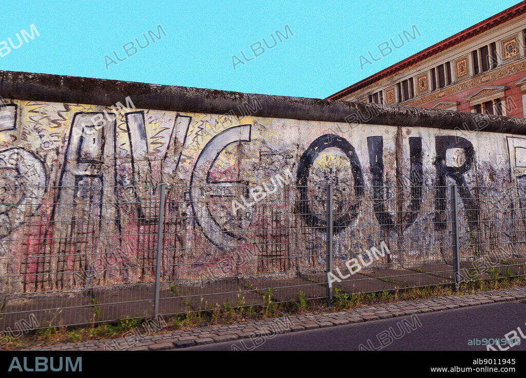 Photograph showing some of the graffiti on The Berlin Wall (Berliner Mauer). The Berlin Wall which was a guarded concrete barrier that divided Berlin from 1961 to 1989. Constructed by the German Democratic Republic (GDR, East Germany) the Wall completely cut off West Berlin from surrounding East Germany and from East Berlin until government officials opened it in November 1989. Its demolition officially began on 13 June 1990 and was completed in 1992. Dated 21st Century.