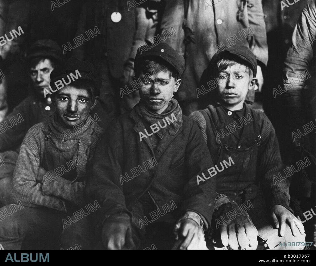 "Breaker Boys" worked 14-16 hours a day in coal mines. They were young boys, usually between the ages of 8 and 12 years old, employed in breaking stage of coal mining, breaking mined coal into relatively uniform sized pieces by hand and separating out impurities such as rock, slate, sulphur, clay and soil. In 1908, Hine accepted a position as chief investigator and photographer for the National Child Labor Committee (NCLC), a private organization founded in 1904 whose mission was to promote legislation to protect children from exploitation by American industry. At the time, children as young as four years old labored in a variety of trades eight to twelve hours a day in factories, tenements, and on the streets. For sixteen years Hine worked for the NCLC, often traveling incognito as an insurance inspector, to gain access to the work environment. He photographed throughout the country in mines, farms, canneries, tenement sweatshops, and on the street, ultimately producing more than five thousand negatives of child labor. Breaker boys working in #9 Breaker at the Hughestown Borough, Pennsylvania Coal Company, Pittston, Pennsylvania. Photograph by Lewis Hine, January 1911.