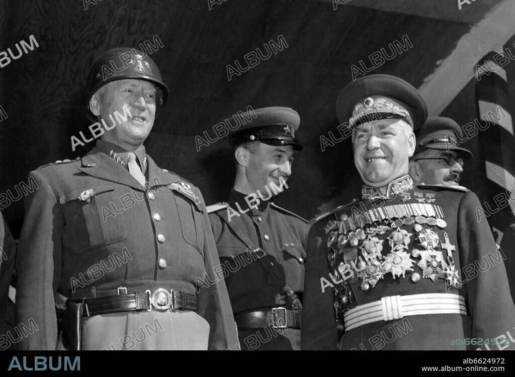 general george smith patton and Georgi Schukow. US General George S. Patton (l) and Russian General Georgy Zhukov (r) during a parade of the allied forces on occasion of the victory of the allies over Japan, on 7th September 1945 in Berlin. 07/09/1945