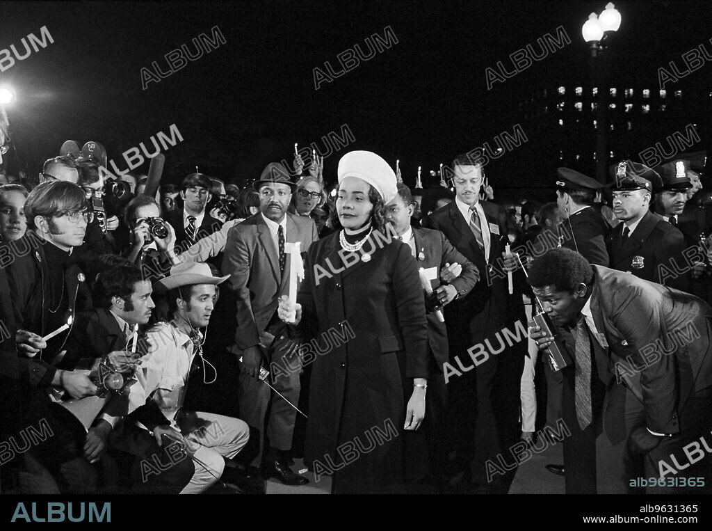 Washington, D.C., October 15, 1969 Coretta Scott King holding a candle and leading a march at night to the White House as part of the Moratorium to End the War in Vietnam.