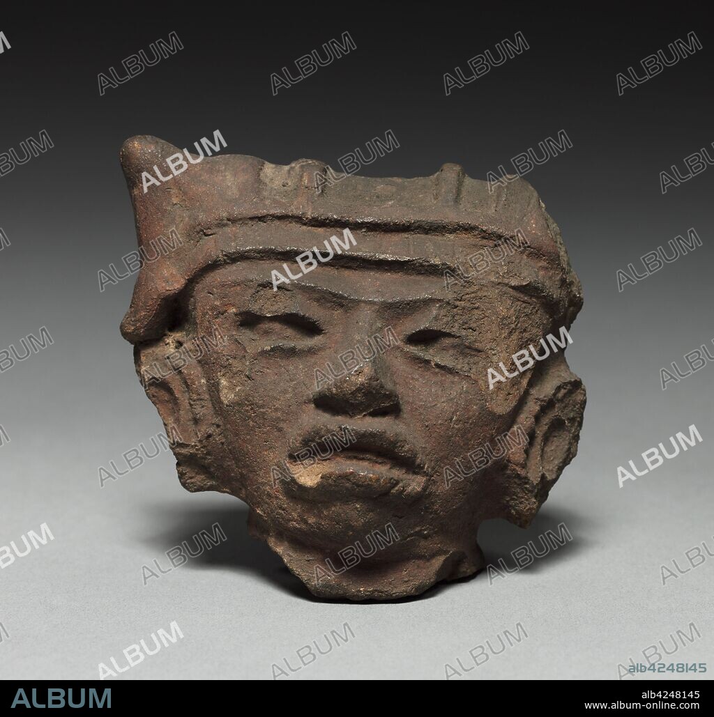 Head, 600-1000. Mexico, 600-1000. Terracotta; overall: 8 x 8 x 3.8 cm (3 1/8 x 3 1/8 x 1 1/2 in.).