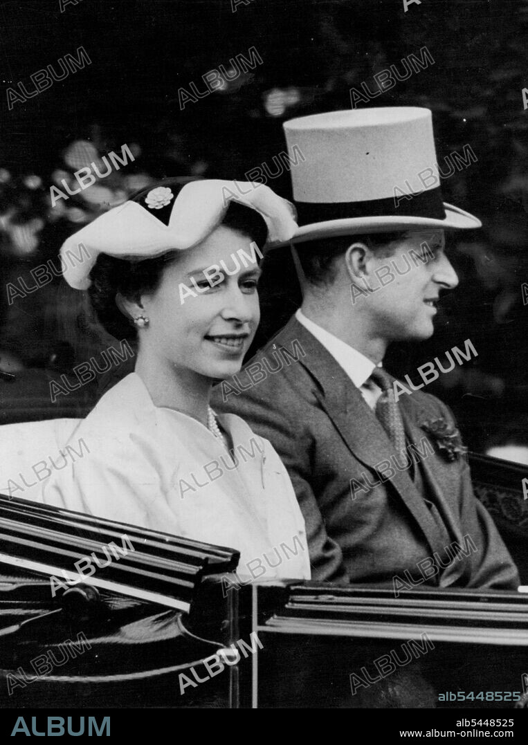 Royal Ascot - Second Day -- A close-up of the Queen and the Duke of Edinburgh driving up the course on arrival at Ascot today. June 16, 1954.