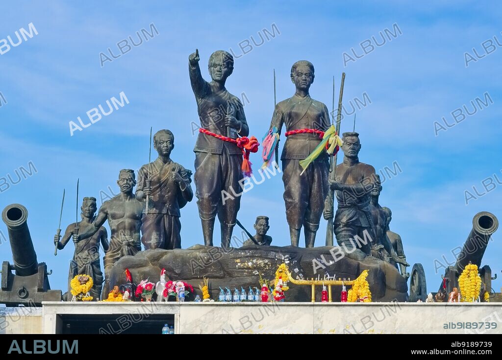 Thailand: The Thalang Victory Memorial. Warrior statues at Phuket Historical Park, Thalang, Phuket, depicting the victory of the people of Phuket over the invading Burmese, 1785-6. Rama I's Chakri dynasty met its first great test in the massive Burmese invasion of 1785. King Bodawpaya of Burma (1745-1819) sent more than 100,000 troops in five armies against Siam. The Burmese forces that invaded southern Thailand enjoyed initial success but were halted at Thalang, in central Phuket, by the bravery of the local defenders. Two sisters, Chan and Muk, the widow and sister-in-law of the late governor, organised the resistance.