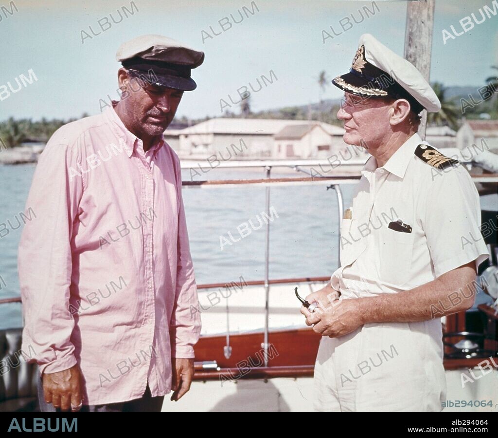 CARY GRANT and TREVOR HOWARD in FATHER GOOSE, 1964, directed by RALPH NELSON. Copyright UNIVERSAL PICTURES.