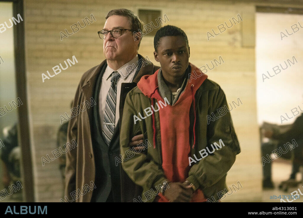 ASHTON SANDERS y JOHN GOODMAN en NACION CAUTIVA, 2019 (CAPTIVE STATE), dirigida por RUPERT WYATT. Copyright DREAMWORKS.