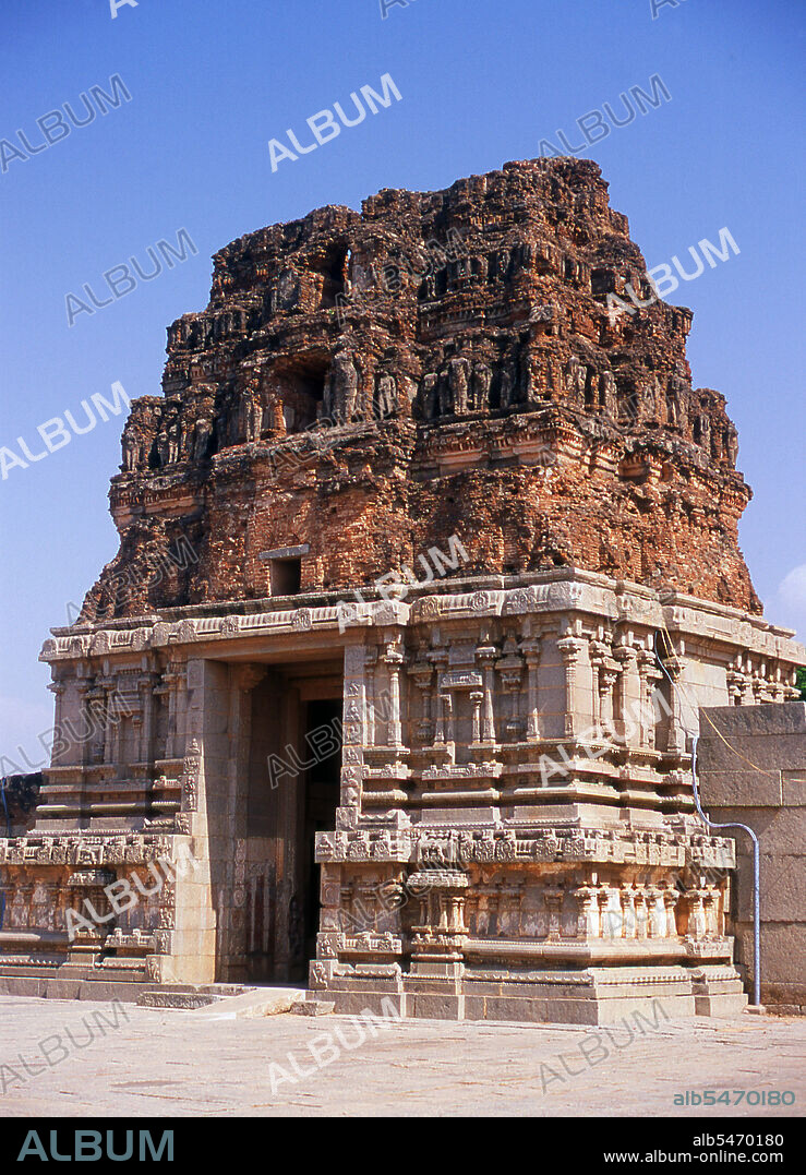 The Vittala Temple, built in the early 16th century, is devoted to the Hindu god Vithoba (also known as Vitthala and Panduranga), an incarnation of Vishnu or his avatar Krishna. Hampi is a village in northern Karnataka state. It is located within the ruins of Vijayanagara, the former capital of the Vijayanagara Empire. Predating the city of Vijayanagara, it continues to be an important religious centre, housing the Virupaksha Temple, as well as several other monuments belonging to the old city.